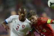 Theodor Gebre Selassie (left) vies with Russian forward Andrey Arshavin (right) during the match on June 8 in Wroclaw